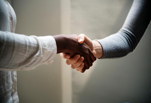 Two people shaking hands